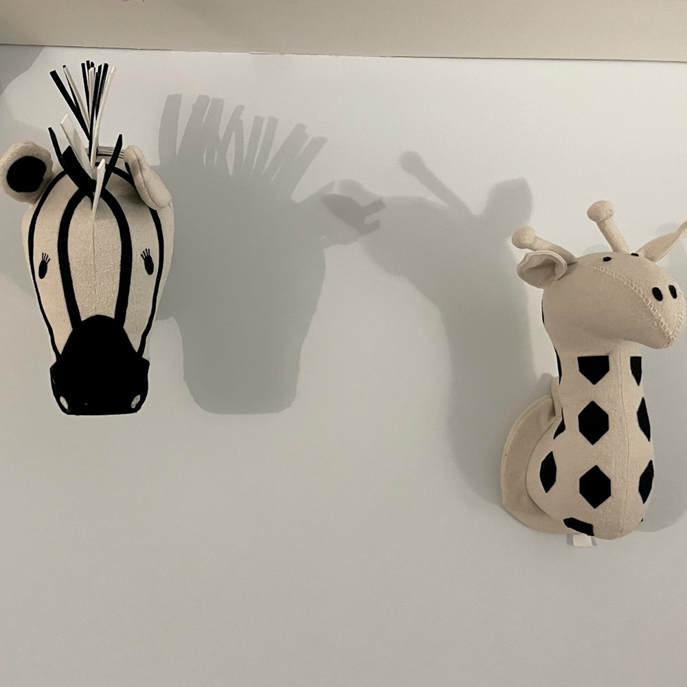 Faux elephant, giraffe and zebra head baby/toddler decor